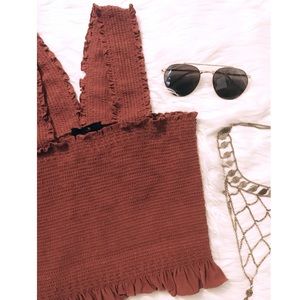 RUST SPAGHETTI HALTER CROP TOP